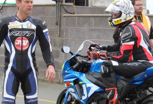 James Whitham prepares to let the riders onto the track at Anglesey.